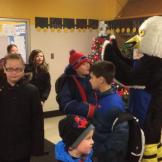 Greeting Eddie the Eagle at the door